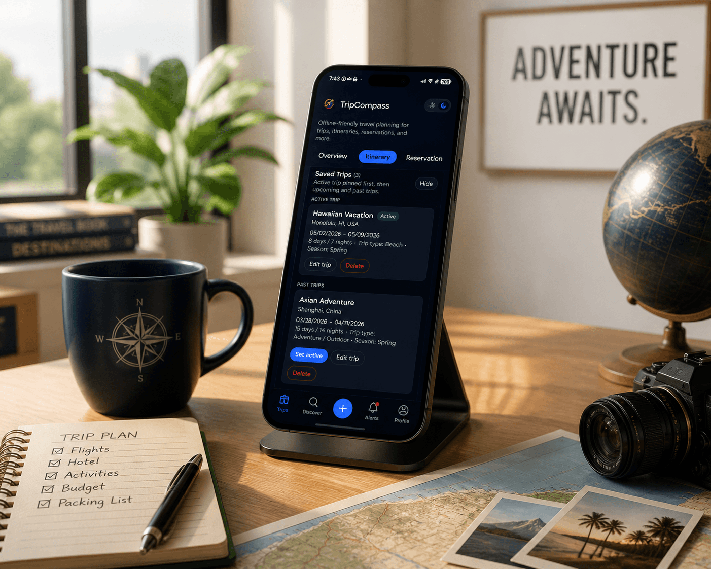 Smartphone displaying a travel itinerary app on a desk with a map, camera, and notebook.